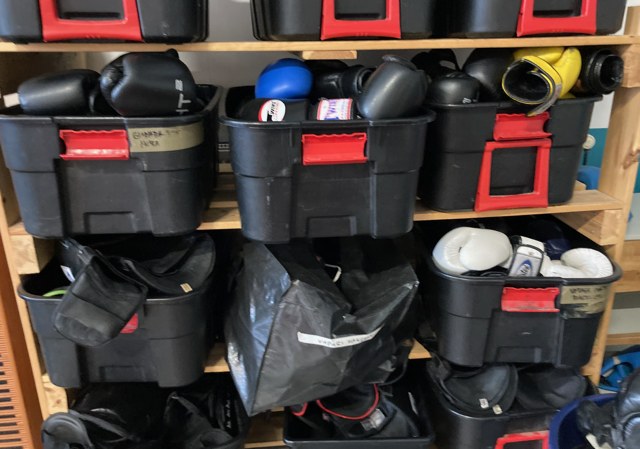 Team sensor and protective gear stored in labelled bins