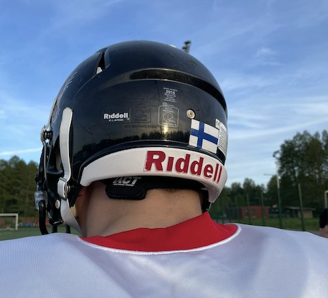 Sensor on the back of a Riddell American football helmet